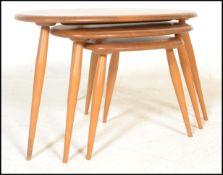 Lucian Ercolani - Ercol - Pebble - A 1970's beech and elm wood nest of table raised on spindle legs.
