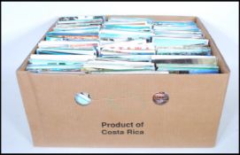 Massive postcard accumulation in banana box . Approx 5,000+ worldwide views. Used & unused