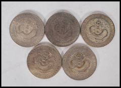 A collection of Chinese coins to include five kwang-tung province coins marked mace and 2