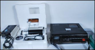 A vintage retro Akai VTS 110 portable video tape recorder set, the set to include tape player, video