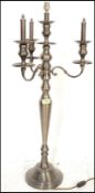 A pair of matching contemporary Georgian revival electric three branch candelabra, each with urn