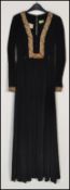 A vintage mid century ladies velvet full length evening gown dress. Velvet with lined interior and