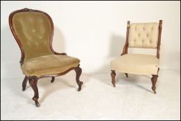 A Victorian mahogany nursing chair. Raised on scroll feet with castors having a show wood mahogany