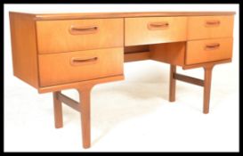 A retro 20th Century teak wood chest of drawers /