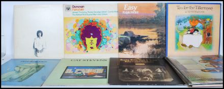 A collection of long play LP vinyl record folk albums to include Don McLean American Pie, Neil Young