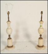 A 20th Century alabaster / marble table lamp of baluster form set to a square base together with a