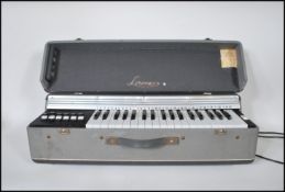 A mid 20th Century 1960's Lorenzo Portable Reed Or