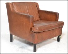 An original retro vintage mid century 1970's Danish made Borge Mogensen armchair. The square form