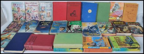 A collection of Captain W.E.Johns hardback books mostly Biggles 1st Editions to include Biggles