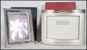 Two contemporary photo frames to include a stamped 925 silver photo frame by Argenti Sovrani
