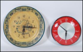A 20th Century wall clock by Metamec having chrome ring with winding mechanism. Together with a