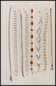 A selection of stamped 925 silver bracelets to include a pandora style snake chain bracelet, a