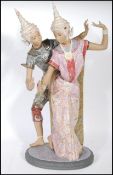 A Lladro very fine tall gres porcelain sculpture depicting Thai dancers, titled 'Thailandia' of
