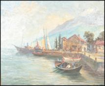 A 20th Century continental oil on canvas painting depicting an Italian lake scene with a mountain to