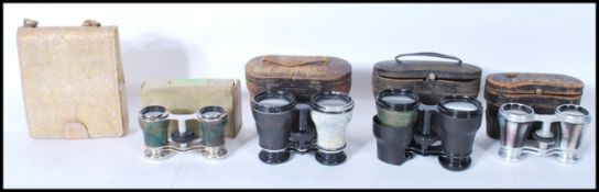 A collection of early 20th Century opera glasses to include cased sets and a opera bag / glasses