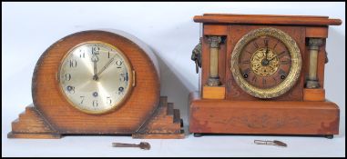 Two early to mid 20th Century mantel clocks to include an Art Deco style clock raised on stepped