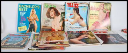 A collection of 20th Century Gentleman's glamour reading publications / magazines dating from the