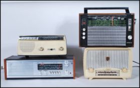 A group of four vintage retro radios to include tw