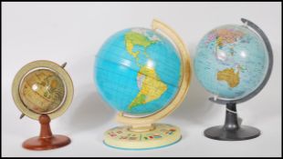 A selection of vintage desktop globes to include a