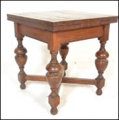 A 1930's small oak draw leaf dining table - side table. This rare small proportion shipping oak