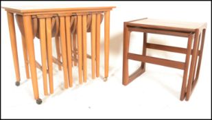 A G-Plan retro teak wood 1970's graduating nest of two tables in the Quadrille pattern. The tables