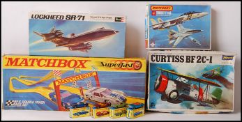 GROUP OF MODEL KITS AND MATCHBOX RACE TRACK SET