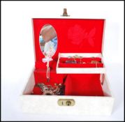 A collection of costume jewellery to include necklaces, brouch, rings and earrings, some of them