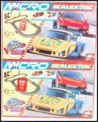 TWO MICRO SCALEXTRIC PORSCHE 911 SLOT RACING CAR SETS
