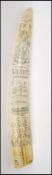 A 20th Century faux scrimshaw tusk engraved Liberty for the ship James Allen being engraved with the