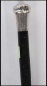 A 19th Century Victorian silver topped Opera walking stick having an ebonised shaft with a silver