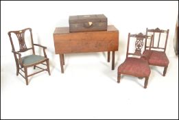 An Edwardian mahogany inlaid bedroom nursing chair with scrolled elbow supports. Together with a