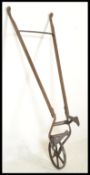 A 19th Century Horace Fuller & Sons hand held garden cultivator / single wheeled hoe, beech wooden
