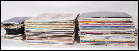 A collection of vinyl long play LP record albums featuring several artists and genres to include
