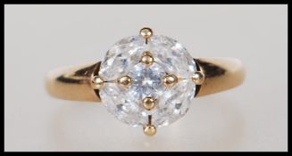 A stamped 375 9ct gold ring set with five white stones to the head. Weight 2.1g. Size O.5.