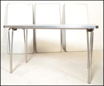 A set of 4 good quality small proportion folding trestle tables having plastic tops with banded
