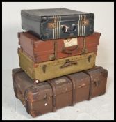A collection of vintage steamer / travel trunks da
