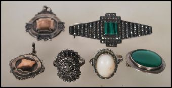 A group of silver jewellery to include a 1920's Art Deco marcasite and malachite 925 stamped brooch,