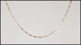 A stamped 375 9ct gold necklace chain having rectangular links with a spring ring clasp. Weight 4.