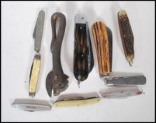 A early 20th century Bull Head Can Opener, together with collection of vintage 20th Century pen