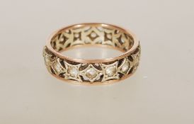 WITHDRAWN- A 9ct gold full eternity ring set with white stones. Weighs 3.4g. Size O.