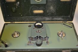A vintage 20th Century EMI military portable reel to reel tape player recorder, green rexine covered
