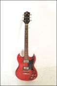 A Gibson SG style six string electric guitar by Co