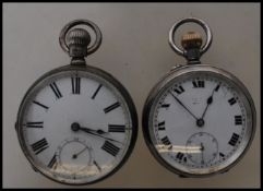 Two silver pocket watches comprising a hallmarked silver Waltham example with white enamel face