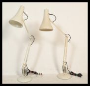 Two vintage retro Herbert Terry 20th Century anglepoise table desk lamps raised on circular bases