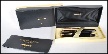 A Pelikan Souveran pen set consisting of pen, pencil and fountain pen, all having black finish