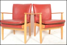 A set of four vintage retro Parker Knoll model 733 open framed armchairs, sweeping arms, seat pads