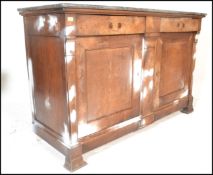 A 19th century French fruitwood and marble brutalist upcycled Buffet De Corps / sideboard. Raised on