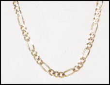 A stamped 9ct gold figaro necklace chain having a lobster clasp. Stamped 10k. Measures 22 inches.