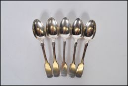 A group of five silver hallmarked tea spoons to include three Georgian William Rawlings Sobey tea