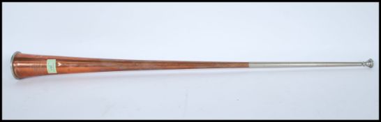 A late 19th Century Victorian copper and nickel hunting horn by Kohler & Sons of typical form,